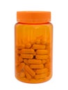 Pills and capsules in a plastic medical small bottle of orange color with a cover isolated on a white background Royalty Free Stock Photo