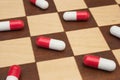 Pills on chessboard