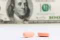 Pills and dollars Royalty Free Stock Photo