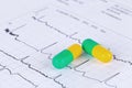 Pills on ECG diagram Royalty Free Stock Photo