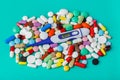 Pills and electronic thermometer 37.5 degrees - medical background