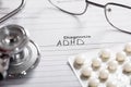 Pills;Glasses And Stethoscope With Text Diagnosis ADHD