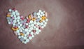 Pills heart top view. Royalty Free Stock Photo