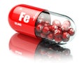 Pills with iron FE element Dietary supplements. Vitamin capsules Royalty Free Stock Photo