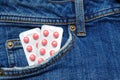 Pills in the Jeans Pocket. Close-Up Of Medicines In Pocket Of Jeans Royalty Free Stock Photo