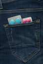 Pills in jeans pocket. Medical concept Royalty Free Stock Photo