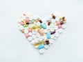 Pill mix heart shape medication illness cure white