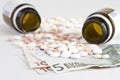 Pills and money Royalty Free Stock Photo