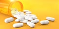 Pills and orange pill bottle on yellow background with copy space.  Prescription drugs Royalty Free Stock Photo