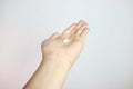 pills in outstretched hand isolated from background Royalty Free Stock Photo