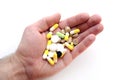 Pills in a palm, a handful of tablets Royalty Free Stock Photo