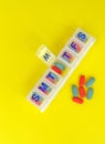 Pills in pill organizer Royalty Free Stock Photo