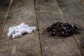 Pills in a plastic container and coffee. Coffee beans in a glass Royalty Free Stock Photo