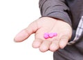 Pills purple in hand male isolated on white background and clipping path. Stop drug use concept Royalty Free Stock Photo