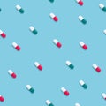 Pills seamless pattern vector background with green and red capsules. Coronavirus cure, medicine health treatment symbol