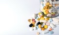Pills spilled out of pill bottle, top view. Medication and medicine tablets. Copy space Royalty Free Stock Photo
