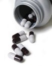 Pills Spilling from Bottle Royalty Free Stock Photo