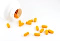 Pills spilling out of bottle Royalty Free Stock Photo