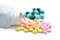 Pills spilling out of pill bottle Royalty Free Stock Photo
