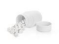 Pills spilling out of pill bottle isolated on white background Royalty Free Stock Photo