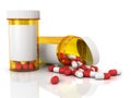 Pills spilling out of pill bottle Royalty Free Stock Photo