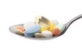 Pills on spoon with clipping path Royalty Free Stock Photo