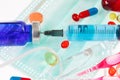 Pills, sterile mask, ampoules and syringe Royalty Free Stock Photo