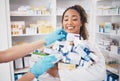 Pills, stock stress and woman pharmacist with medicine box, retail and supplements in a pharmacy with chaos. Healthcare Royalty Free Stock Photo
