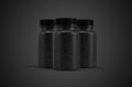 Pills or supplement capsules clear black bottles front view