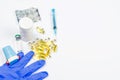 pills, syringe, gloves on a white background Royalty Free Stock Photo