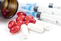 Pills with syringes Royalty Free Stock Photo