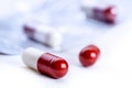 Pills. Tablets. Capsule. Heap of pills. Medical background. Close-up of pile of red white tablets - capsule. Pills and tablets. Royalty Free Stock Photo