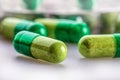 Pills. Tablets. Capsule. Heap of pills. Medical background. Close-up of pile of yellow green tablets Royalty Free Stock Photo