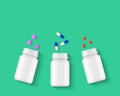 Pills, tablets and capsules with white pill bottles