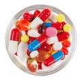 Pills, tablets and drugs heap in glass Royalty Free Stock Photo