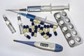 Blue syringes, blue thermometer, blue pills and ampules. Royalty Free Stock Photo