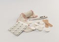 Pills, thermometer, bandage and plasters Royalty Free Stock Photo