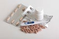 Pills and thermometer seven Royalty Free Stock Photo