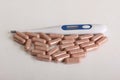 Pills and thermometer two Royalty Free Stock Photo