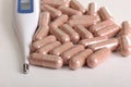Pills and thermometer one Royalty Free Stock Photo