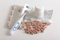 Pills and thermometer six Royalty Free Stock Photo