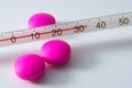 Pills and thermometer Royalty Free Stock Photo