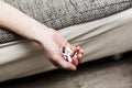 Pills in woman hand, drug addiction Royalty Free Stock Photo