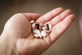 Pills in woman hand, drug addiction Royalty Free Stock Photo