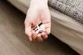 Pills in woman hand, drug addiction Royalty Free Stock Photo