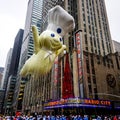 The Pillsbury Doughboy balloon floats in the air during Macy`s Thanksgiving Day parade along Avenue of Americas