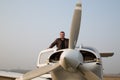 Pilot with the aircraft after landing