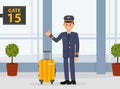 Pilot of aircraft waiting for flight. Man in uniform with suitcase standing in waiting hall of airport doing thumb up Royalty Free Stock Photo