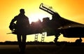 Pilot on airfield walking away from the fighter jet Royalty Free Stock Photo