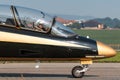 Pilot from the Al Fursan Aerobatic team of the United Arab Emirates Air Force in the cockpit of Aermacchi MB-339 jet training airc Royalty Free Stock Photo